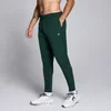 MP Men's Training Woven Joggers − muški donji deo trenerke − tamnosmaragdni