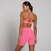Ženski Tempo Twist Back sportski grudnjak MP - Vibrant Pink